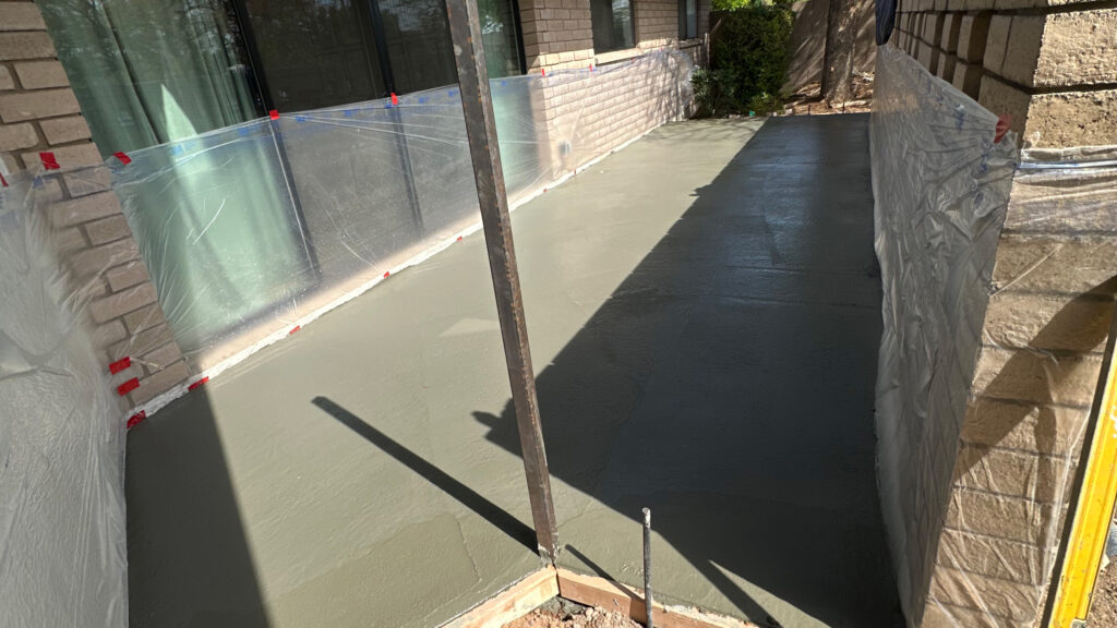 Learn what drives concrete patio and slab costs in Phoenix, how thickness, base prep, and caliche affect bids, and what helps prevent cracks.